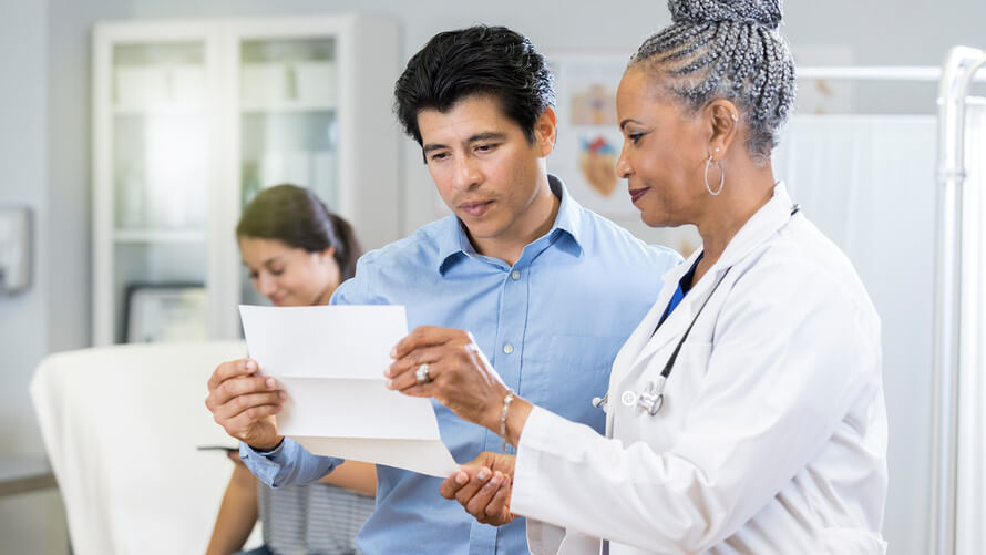 doctor reading result to the patient