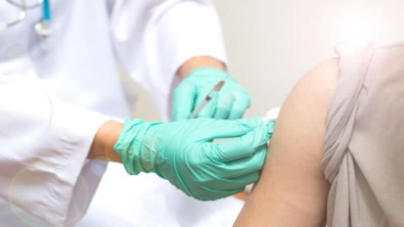 injecting flu shot