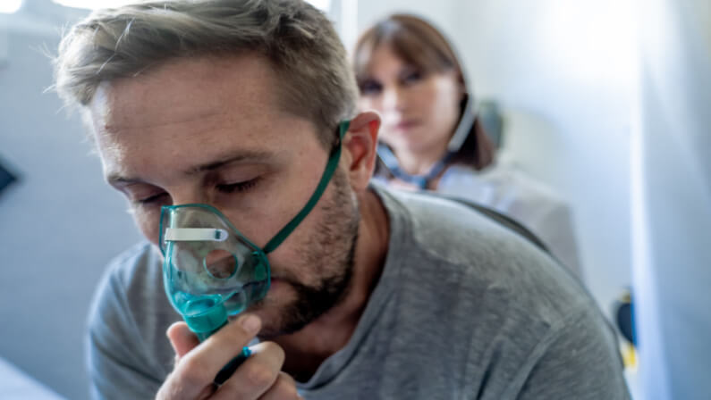 man suffering from asthma