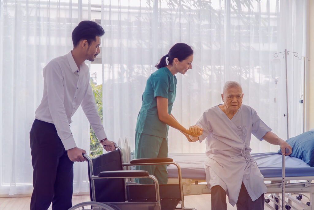 Doctor holding patient's hand