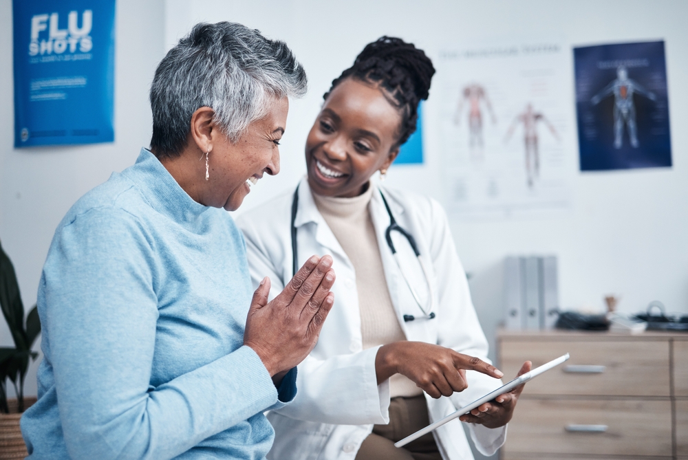 Black woman, doctor and elderly patient with good news